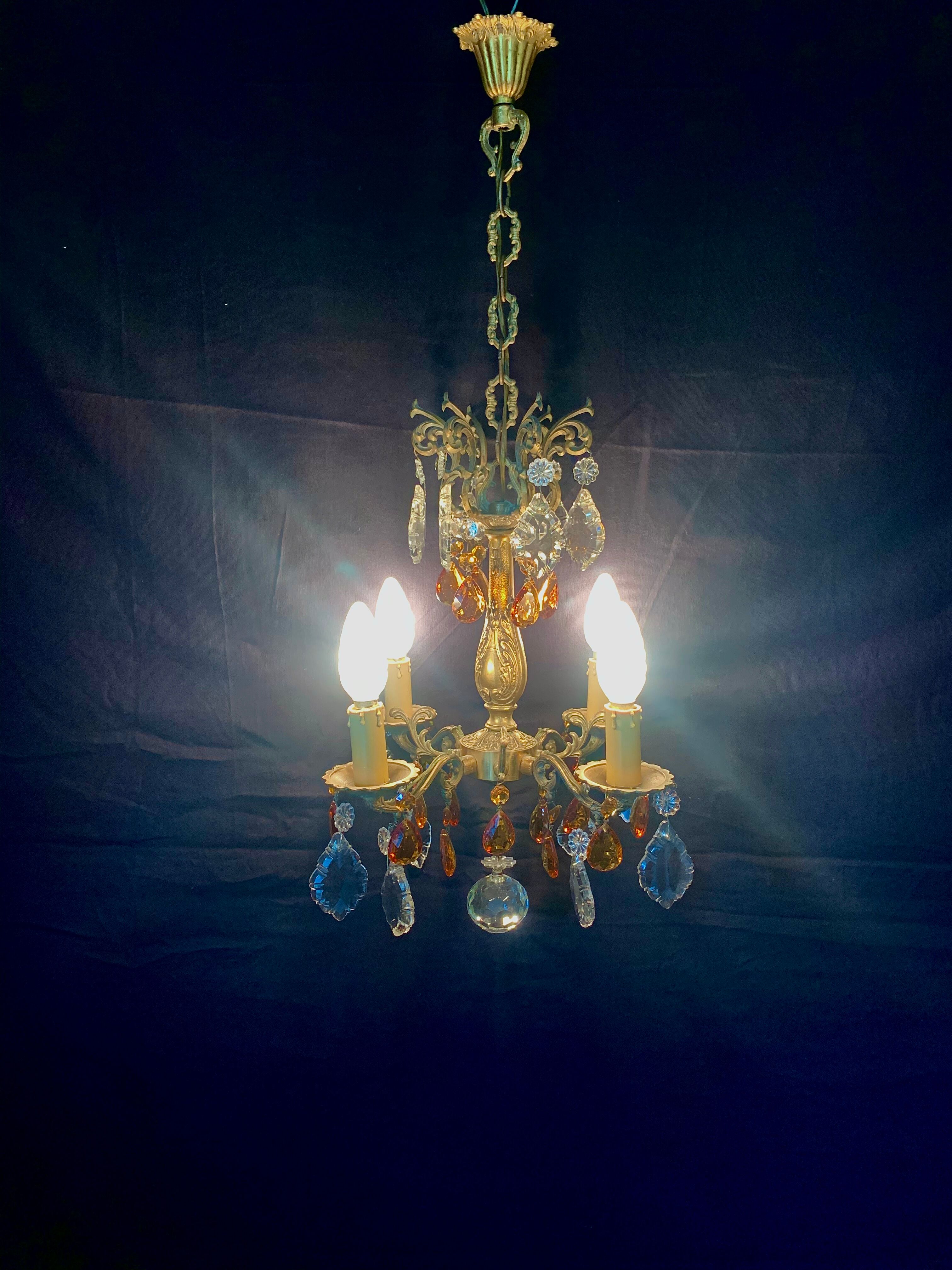 4 bronze lights and tassels chandelier