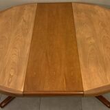 Table scandinave ronde vintage à pied central étoile extensible Baumann
