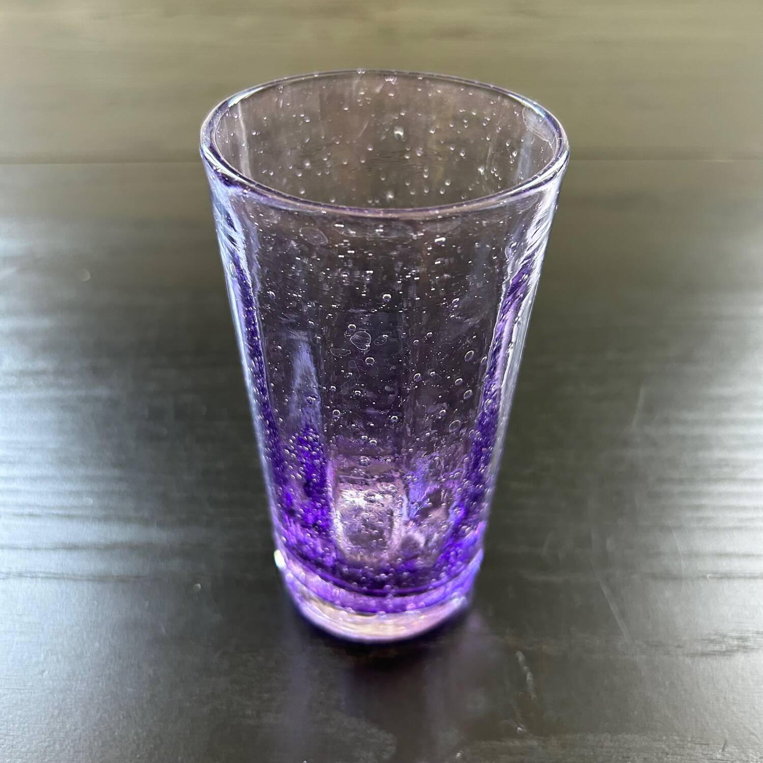 Biot glass in purple glass