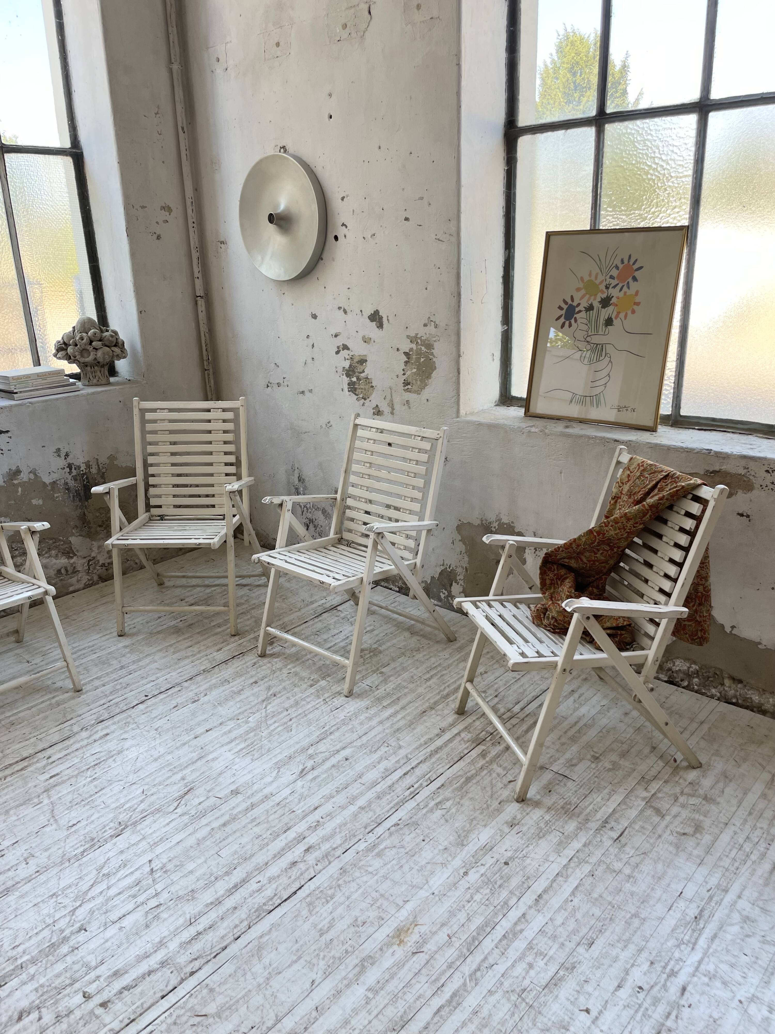 4 white wooden garden chairs