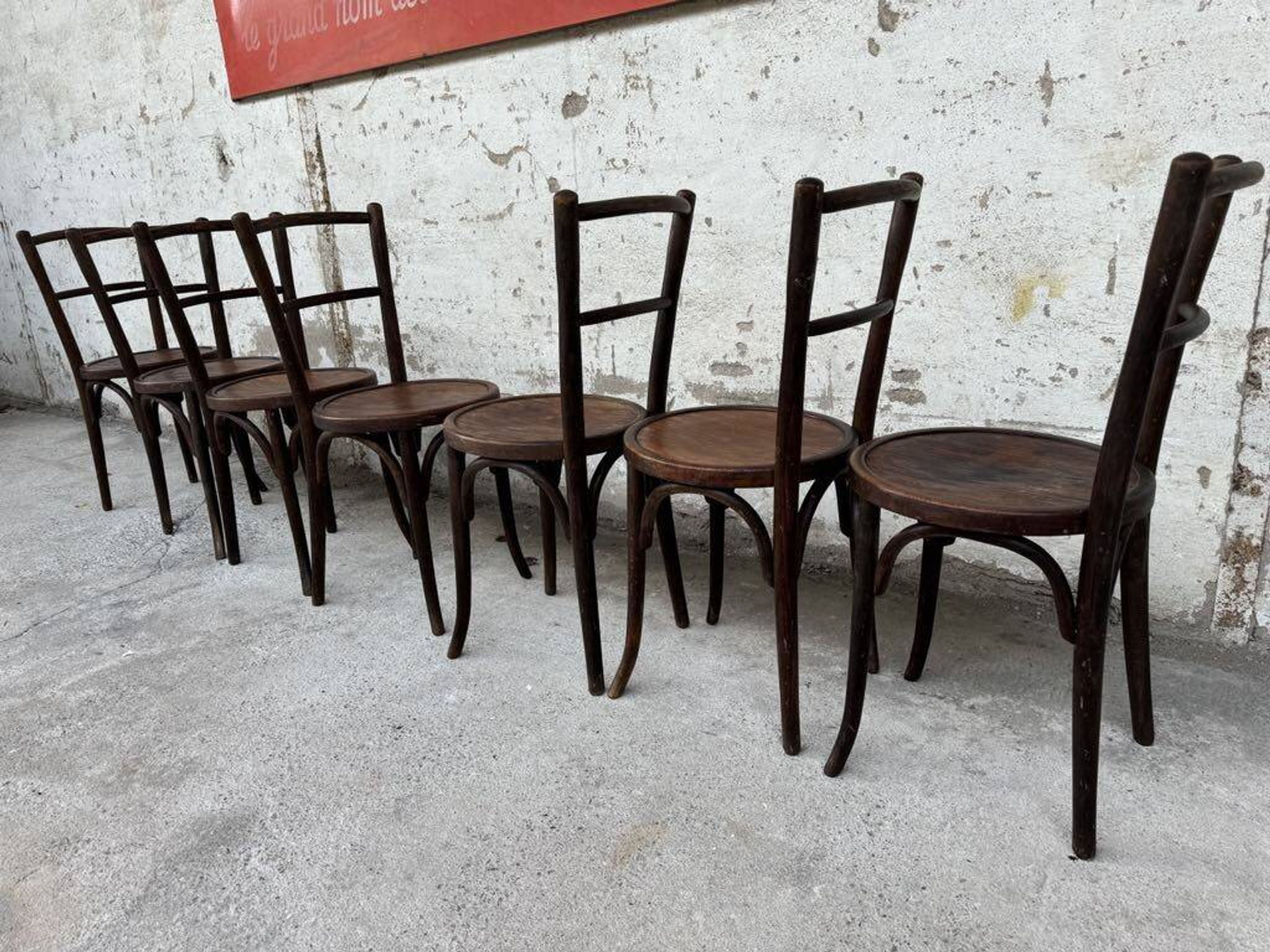 Set of 7 old Baumann bistro chairs in curved wood with round seat