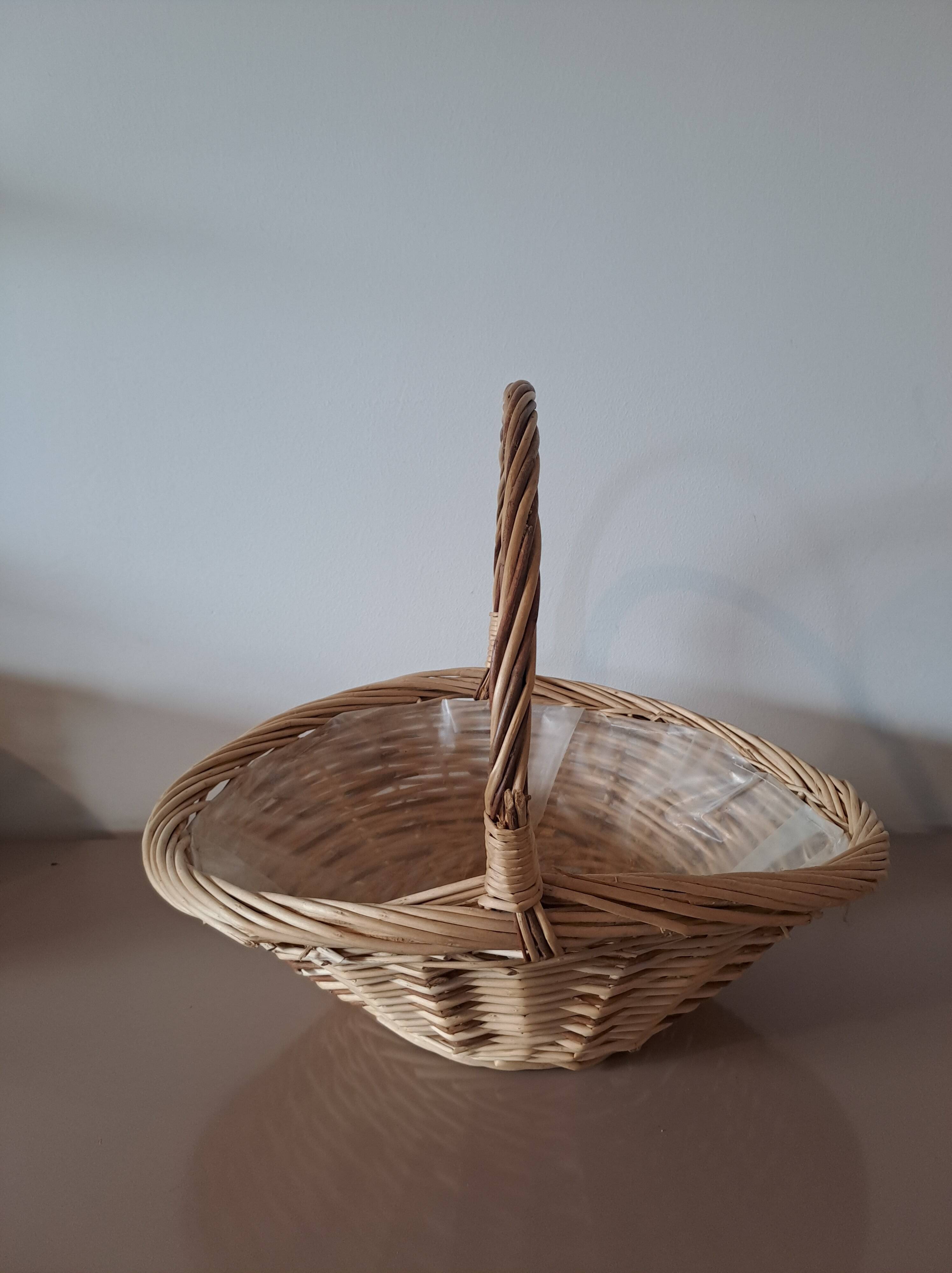 Natural wicker basket with twisted handle – vintage decorative basket