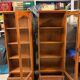 Set of 2 solid wood display cabinets with glass doors.