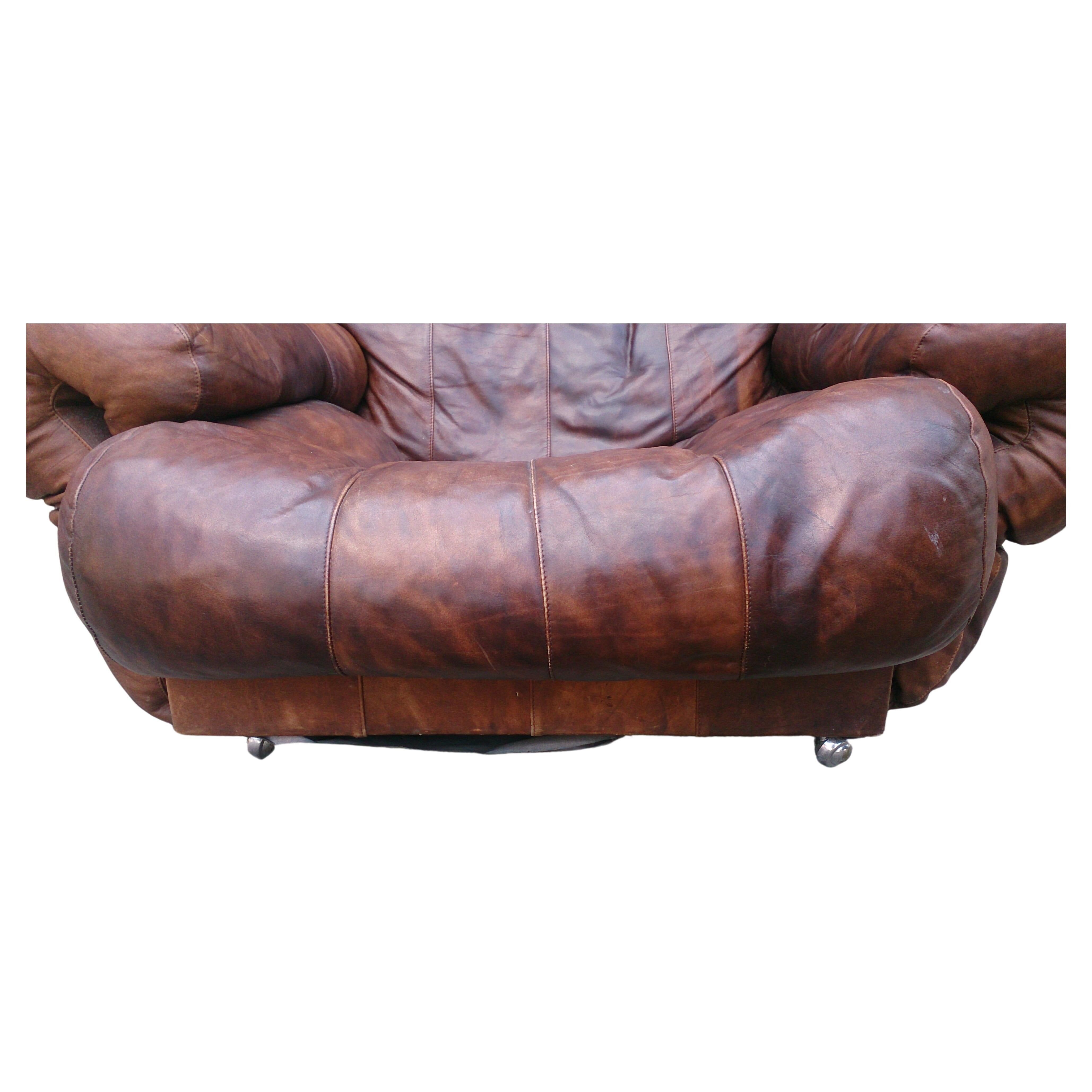 Vintage brown leather lounge chair