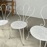 4 vintage wrought iron chairs