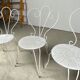 4 vintage wrought iron chairs