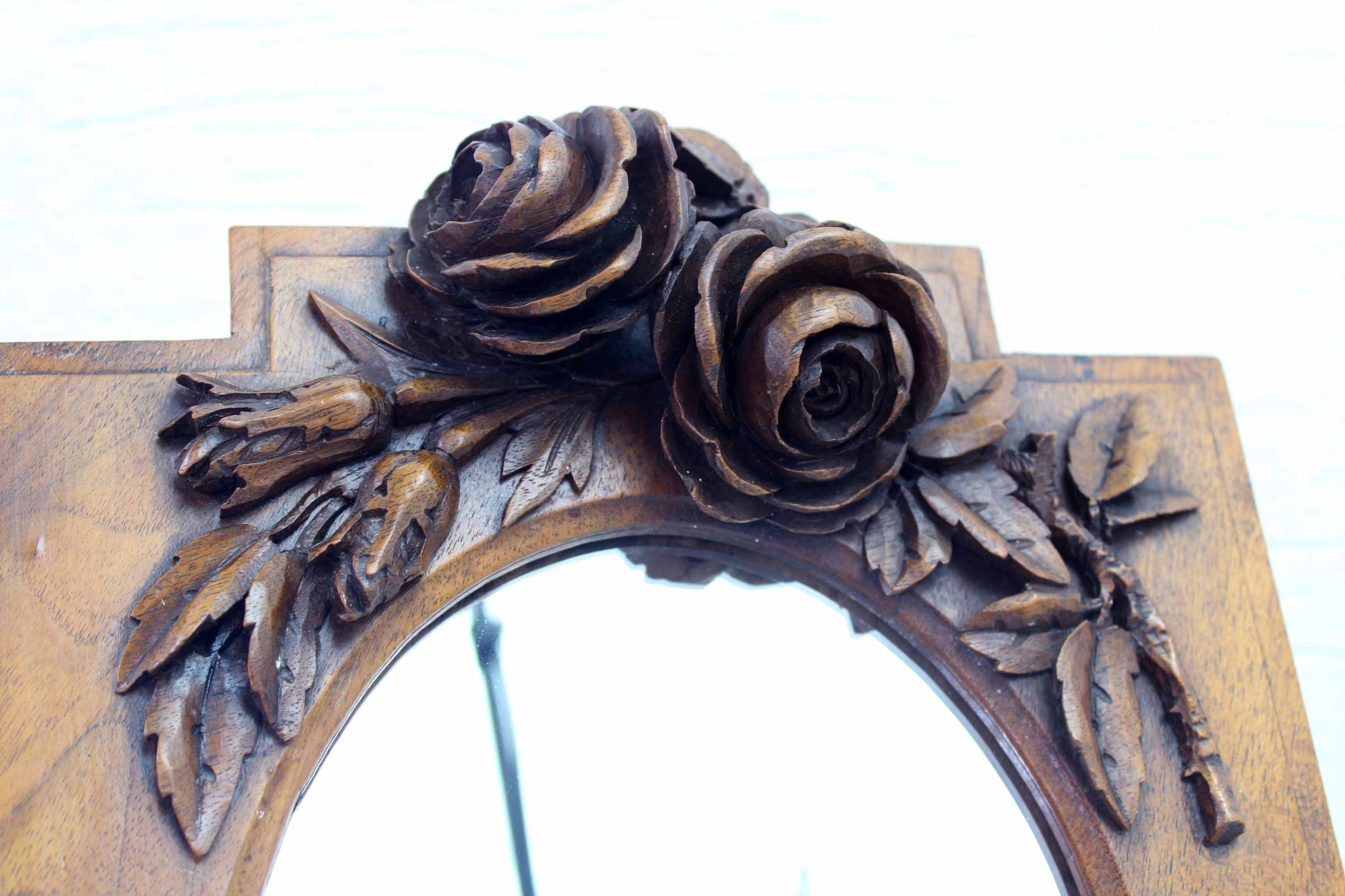 Ancient carved walnut frame mirror