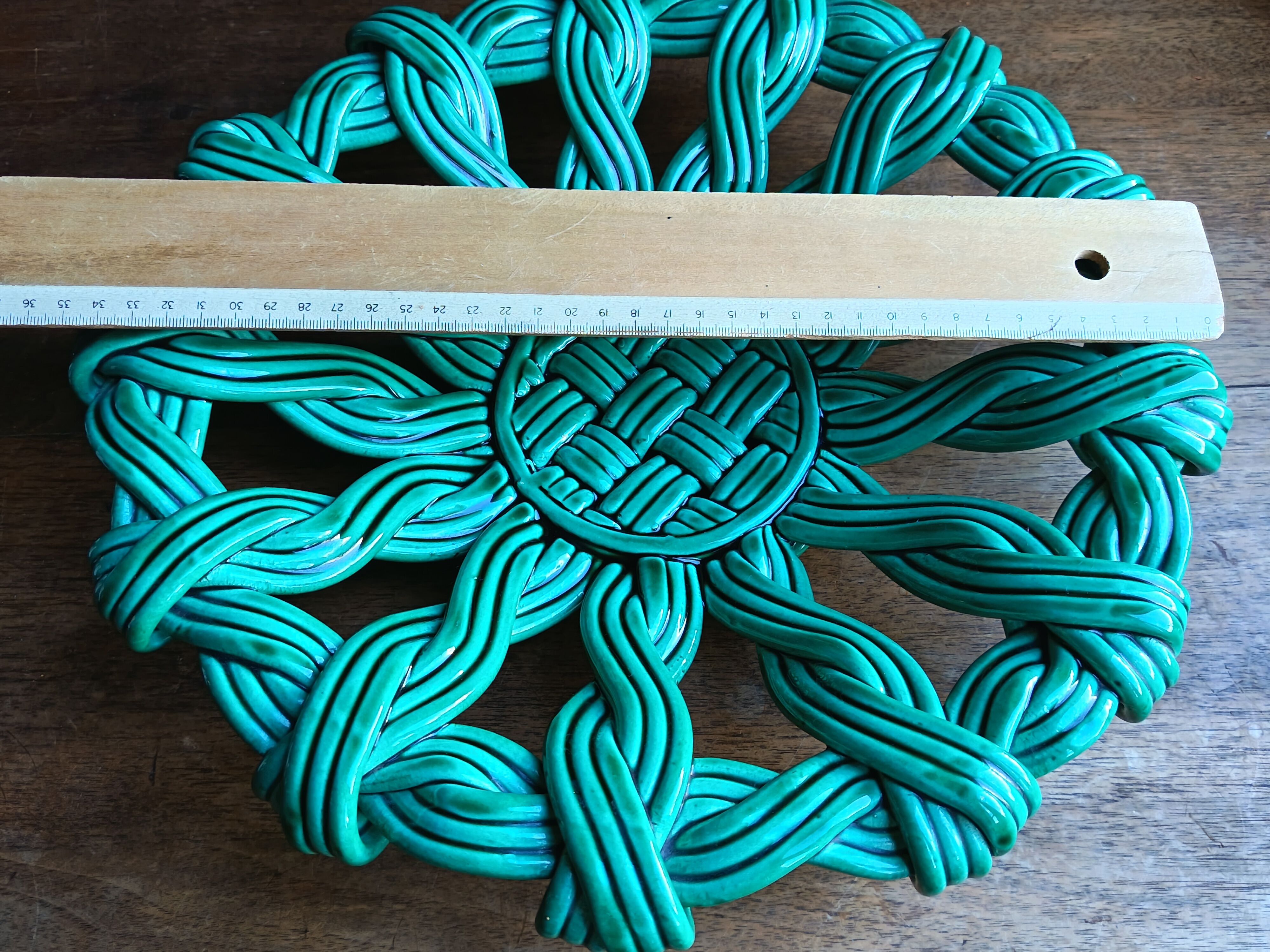 Woven green ceramic basket