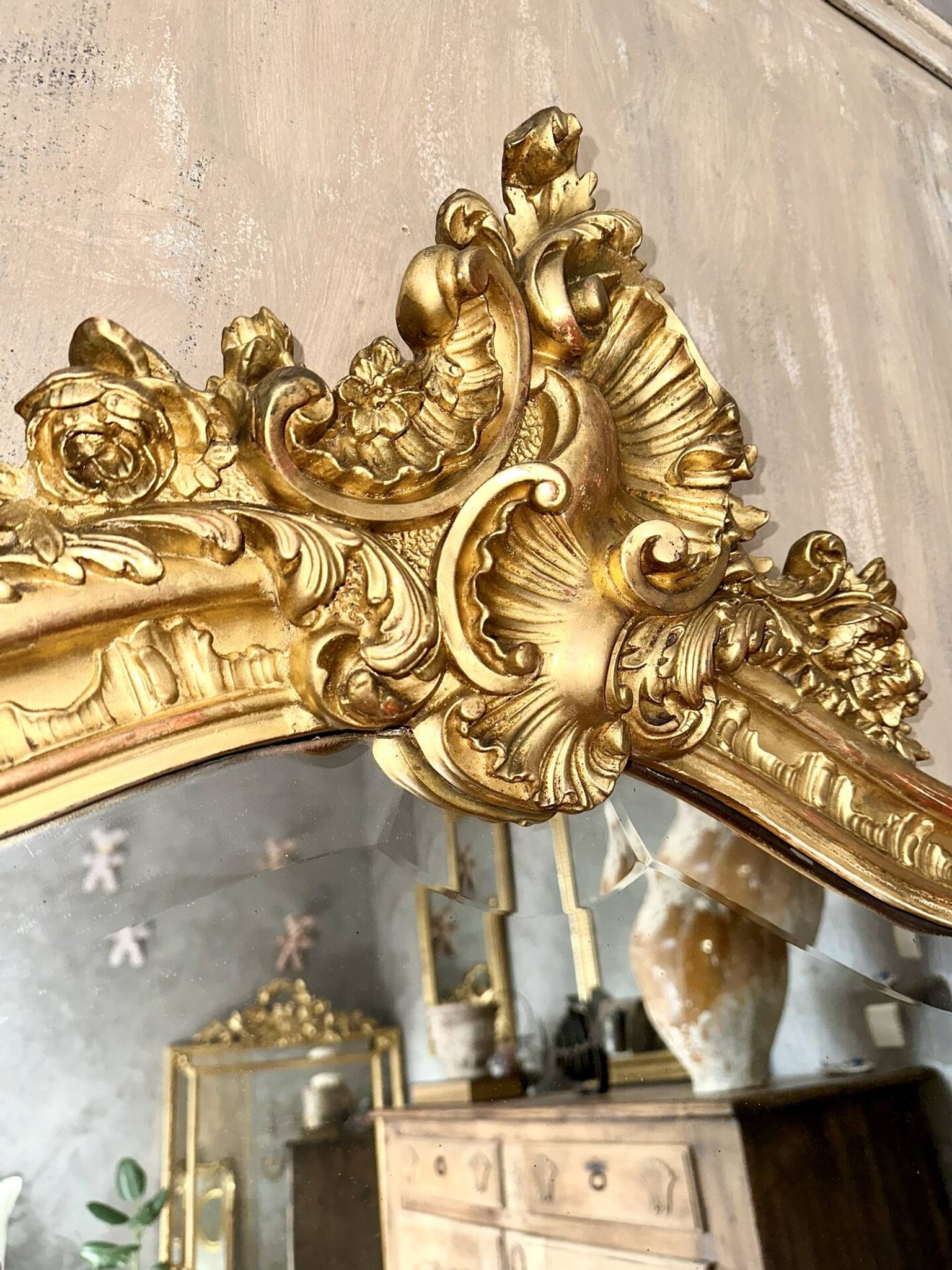 Antique gilded Louis XV pediment mirror
