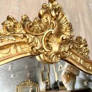 Antique gilded Louis XV pediment mirror
