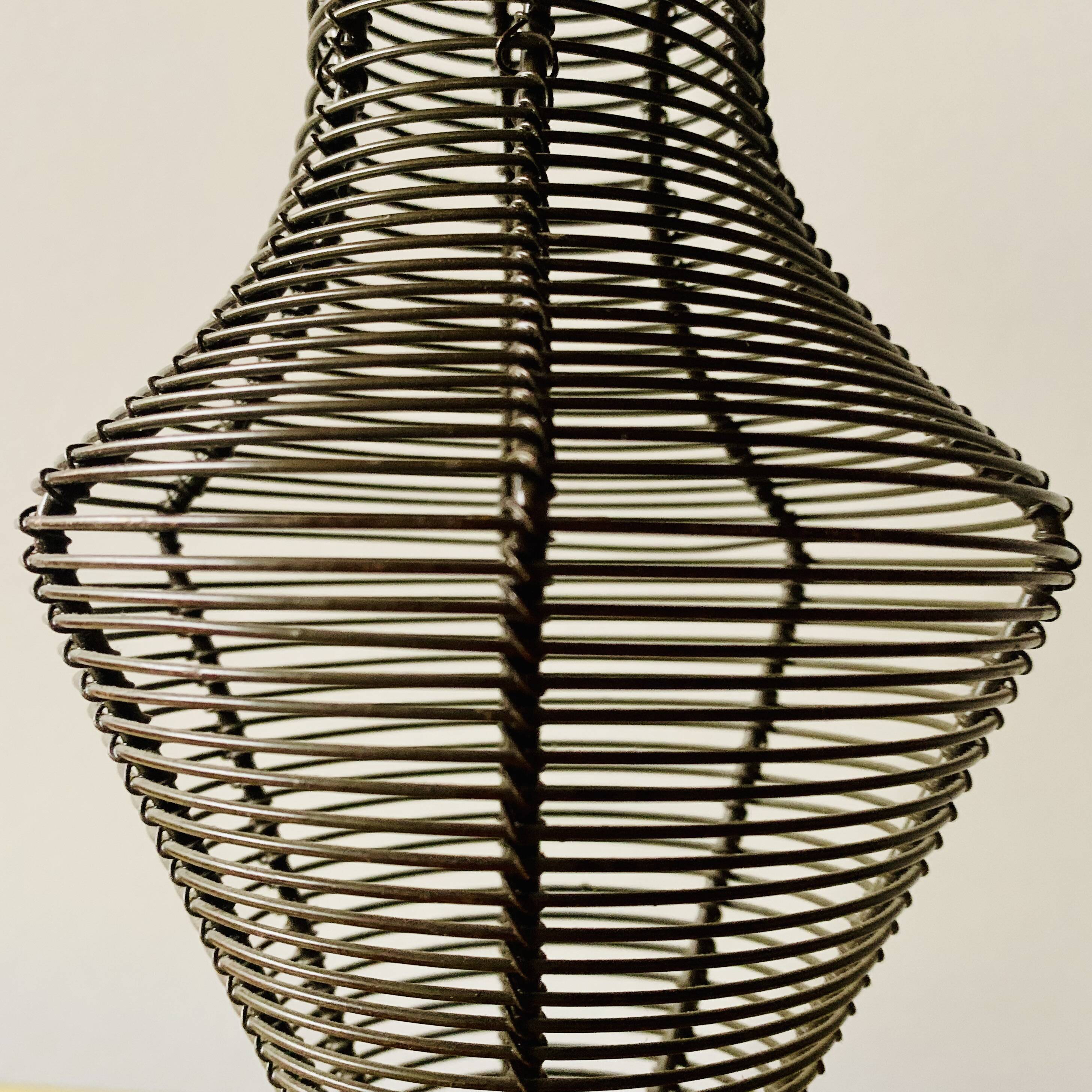 Old decorative wire vase