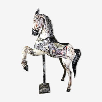 Carved wooden riding horse