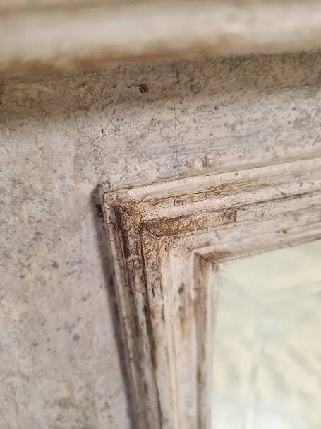 Beveled mercury patinated trumeau mirror
