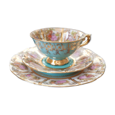Tasse à thé avec assiette à dessert