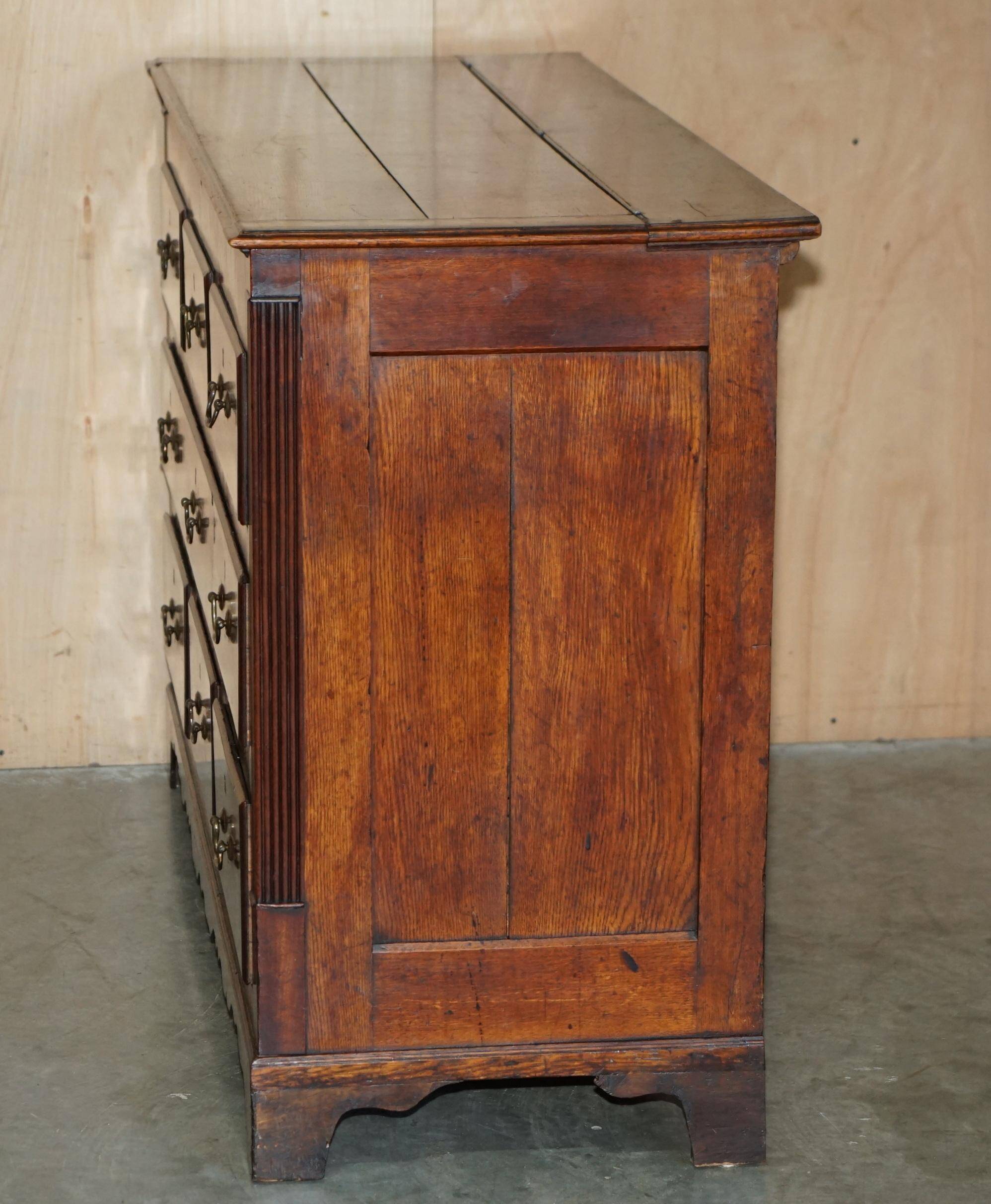 Georgian oak commode with a folding top, English, 18th century.