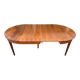 Round extendable dining table Louis XVI in cherry wood from the 1960s.
