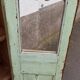 Armoire vitrée patinée verte