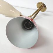 Double adjustable wall light from the 50s in brass and red and cream metal