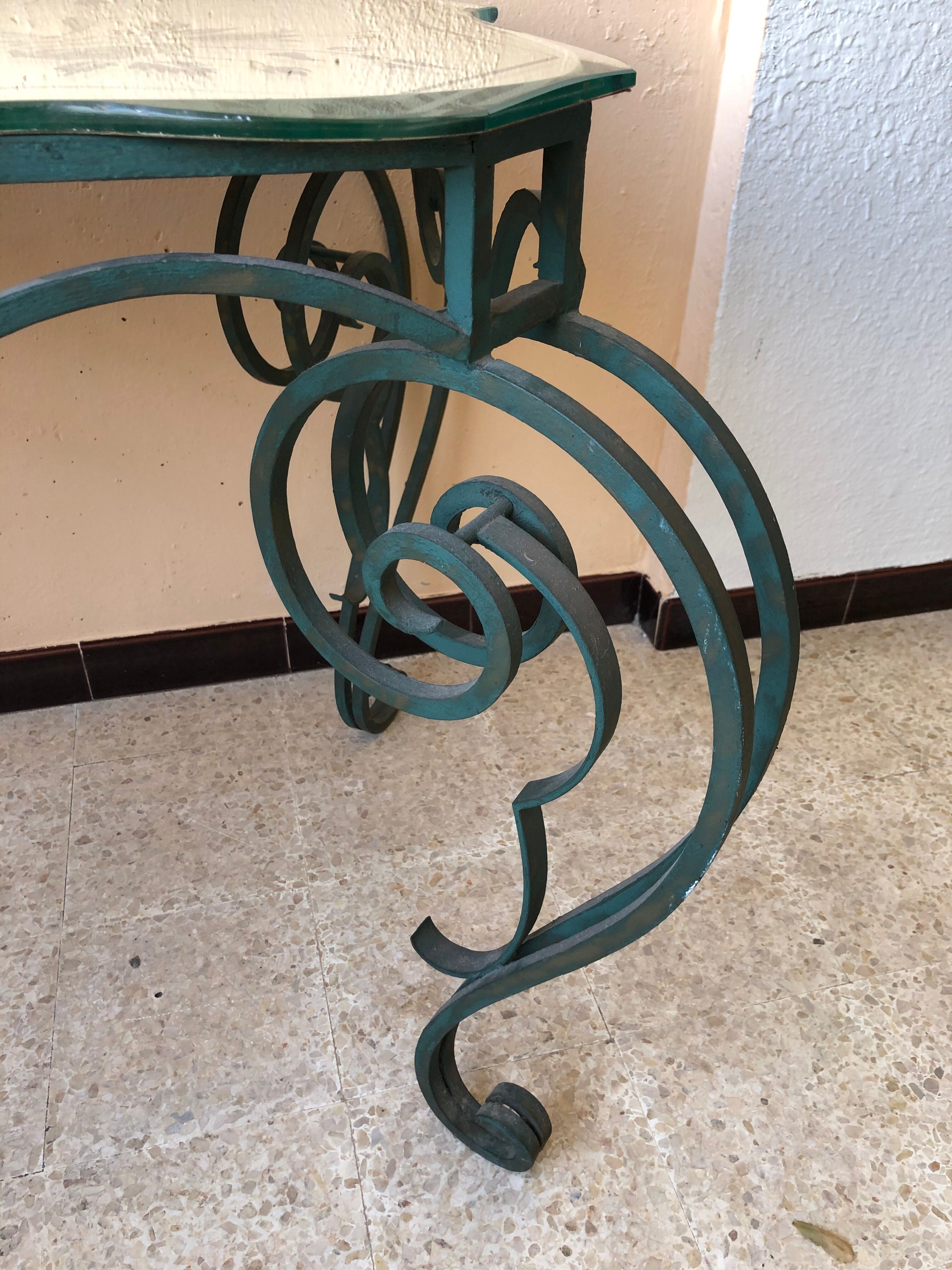 Wrought iron and engraved mirror