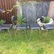 4 Chairs with chrome tubular metal base and black Skaï