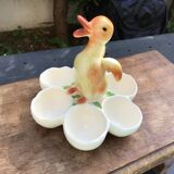 Egg cup with central chick decoration