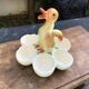 Egg cup with central chick decoration