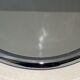 Oval chrome mirror in Art Deco style. Circa 1970.