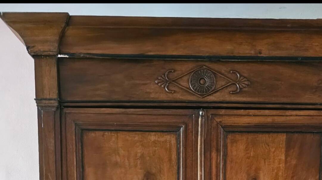 Directoire period wardrobe in solid walnut.