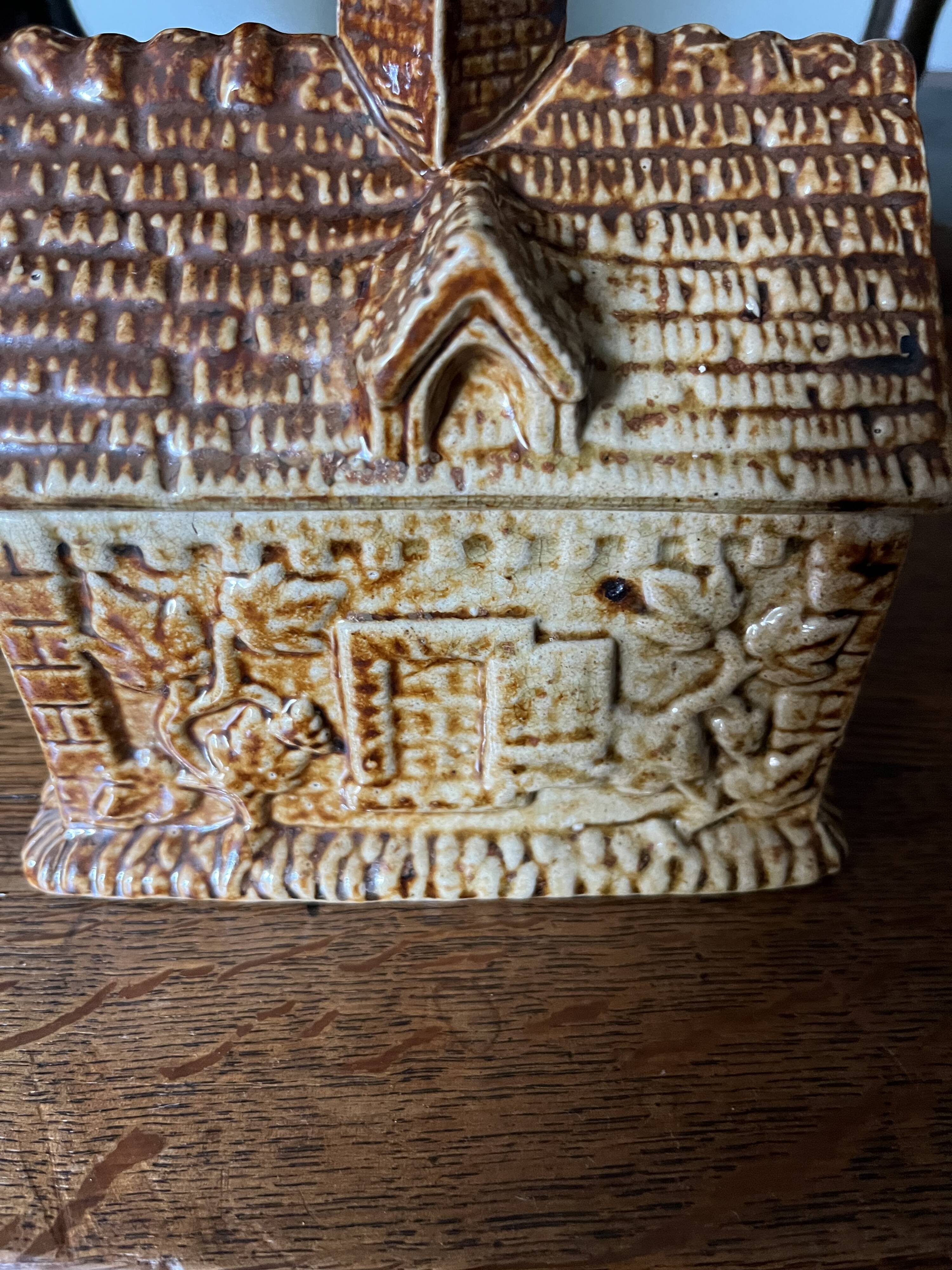 Brown salt-glazed stoneware tobacco pot with candle holder, 1840/1880