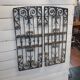 Ancienne paire de grilles en fer forgé