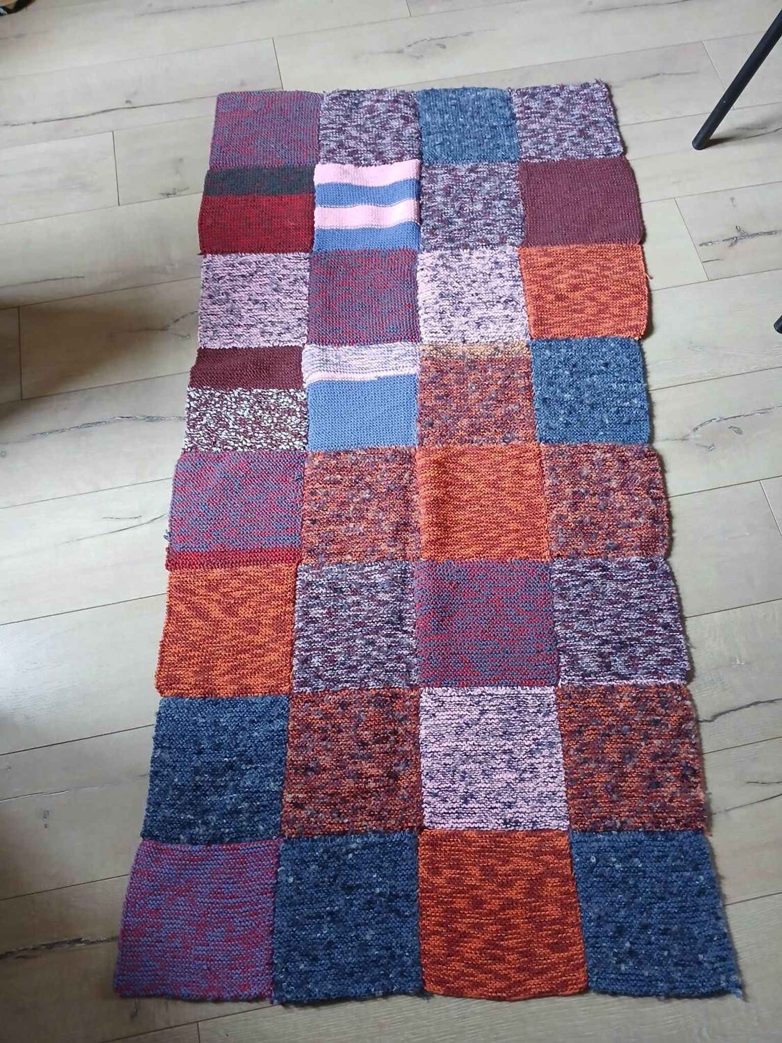 Plaid en patchwork tricoté main