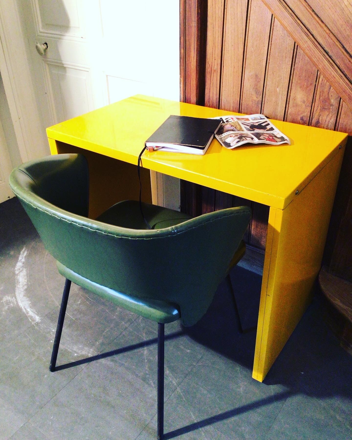 Small yellow metal desk
