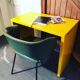 Small yellow metal desk