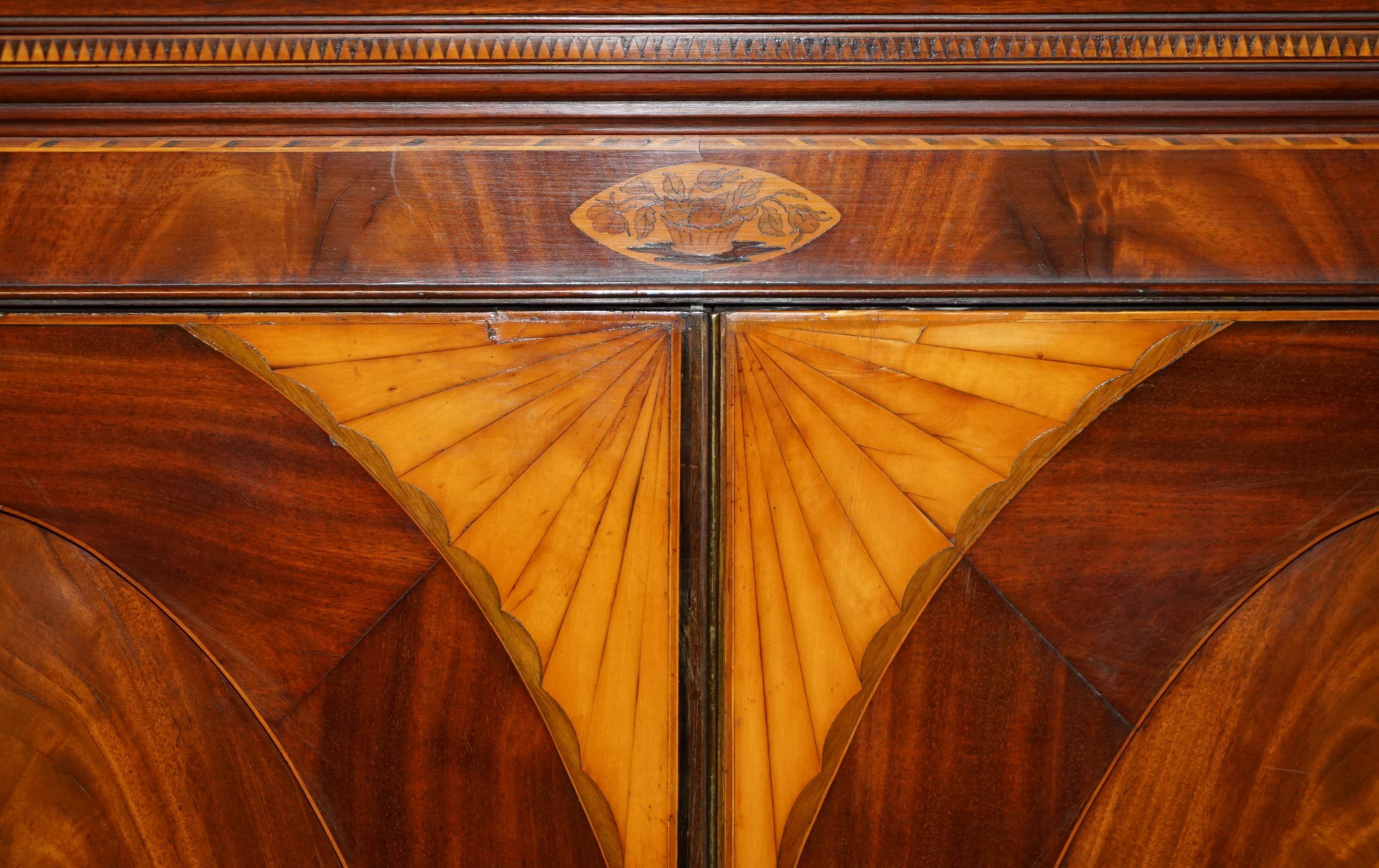 George III Sheraton linen cupboard in walnut, circa 1760.