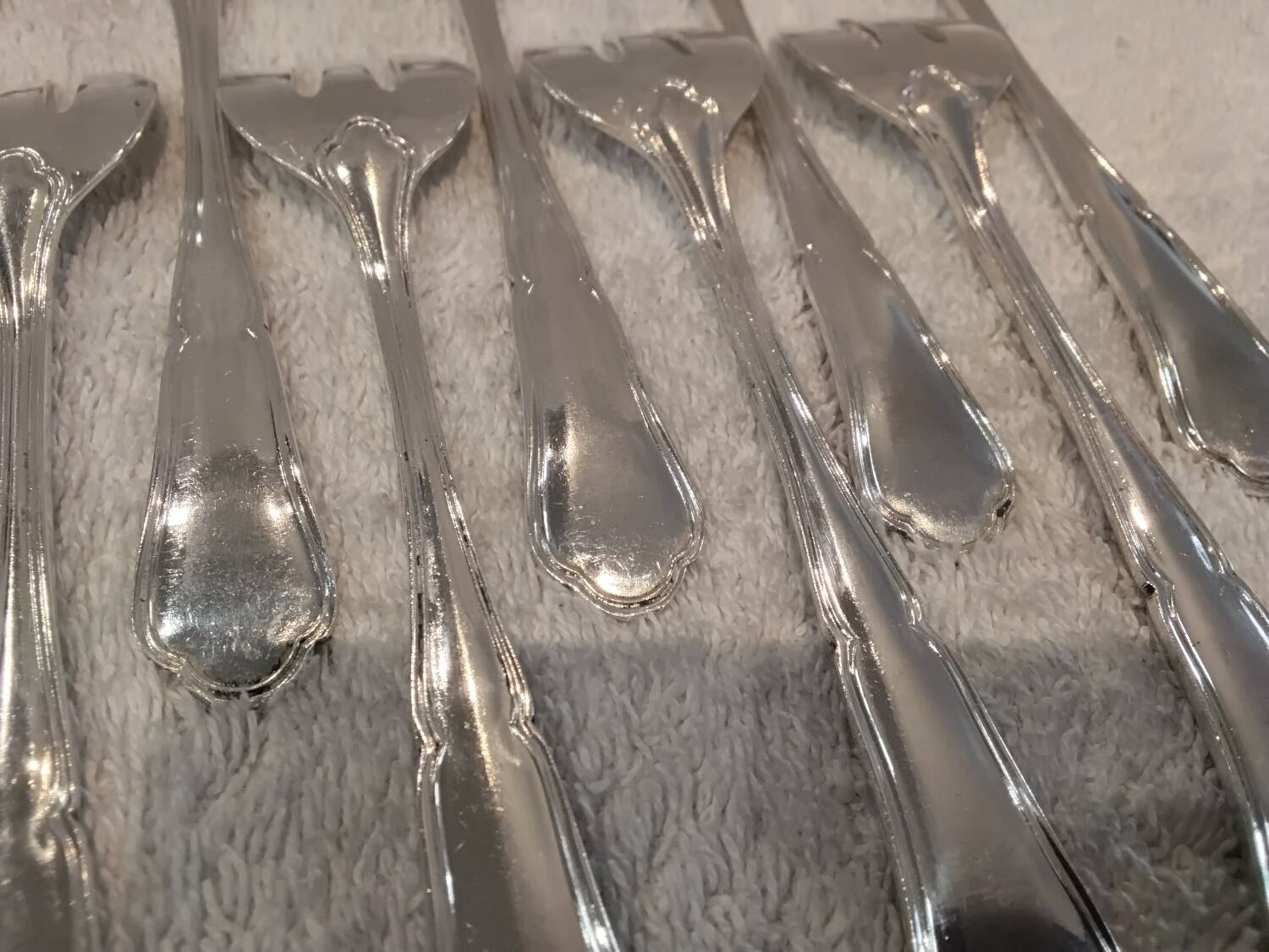 11 silver-plated oyster forks by Orbrille, 13.2cm