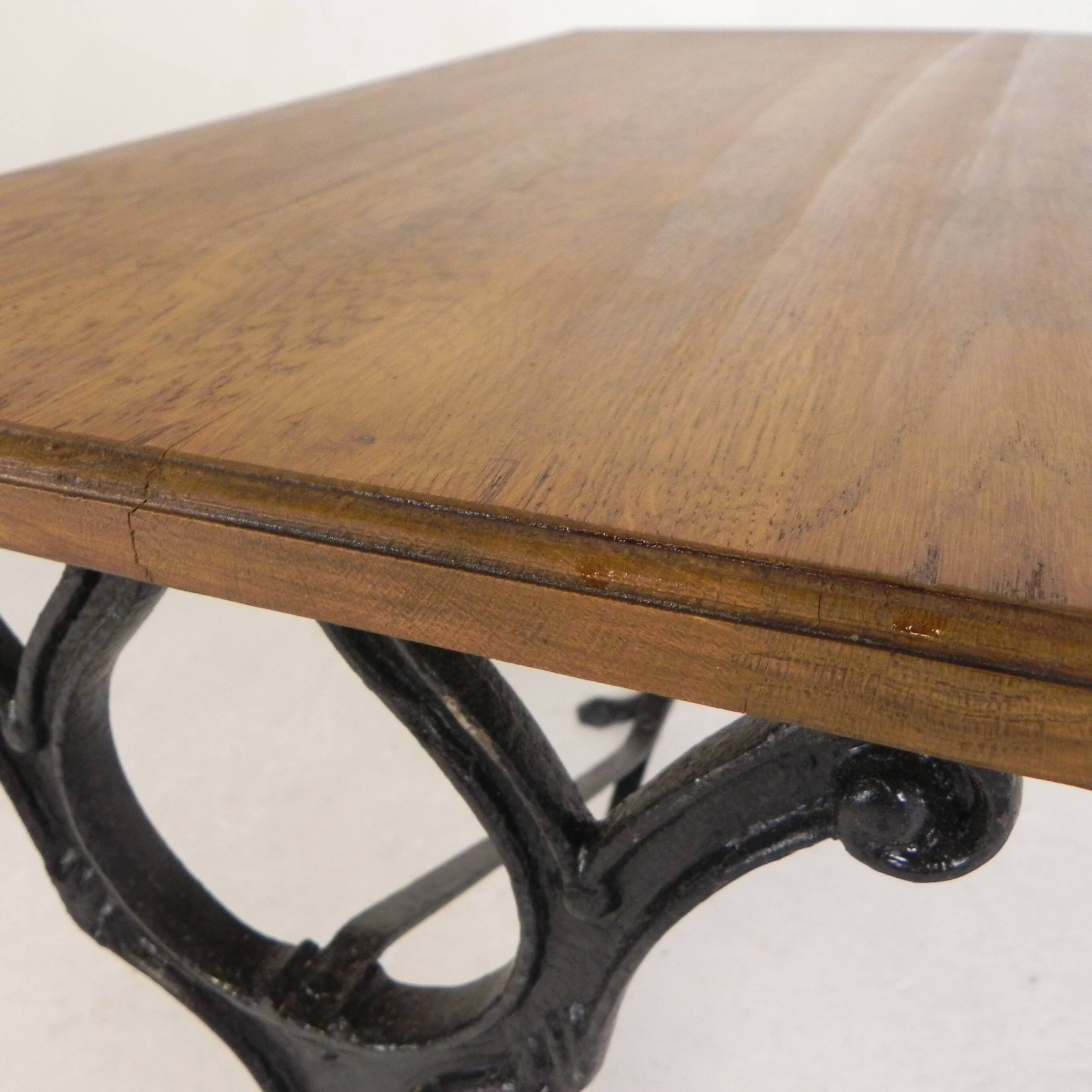 Bistro table with an oak top on a cast iron base, 1930s.