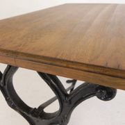 Bistro table with an oak top on a cast iron base, 1930s.