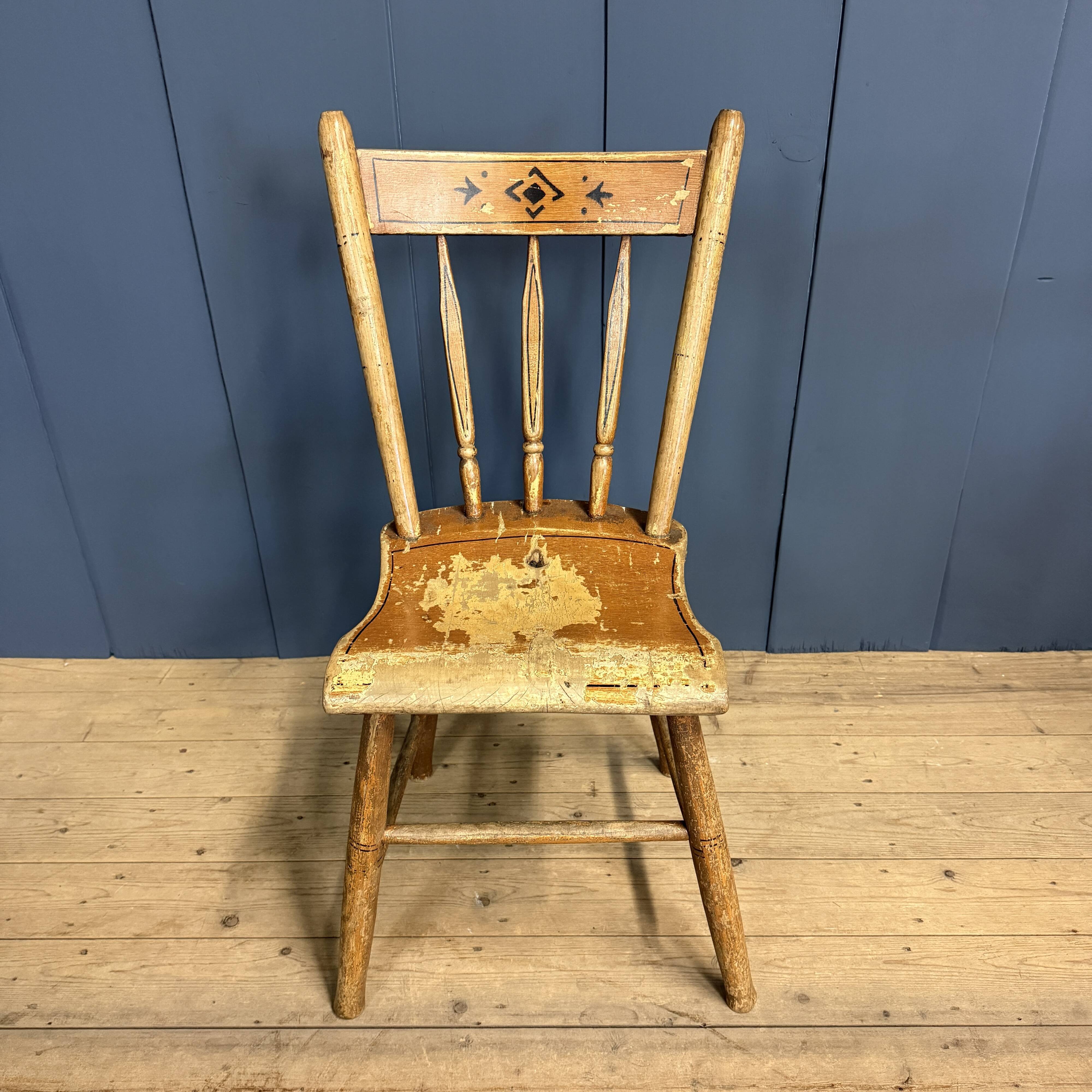 Set of four painted Dutch kitchen chairs.