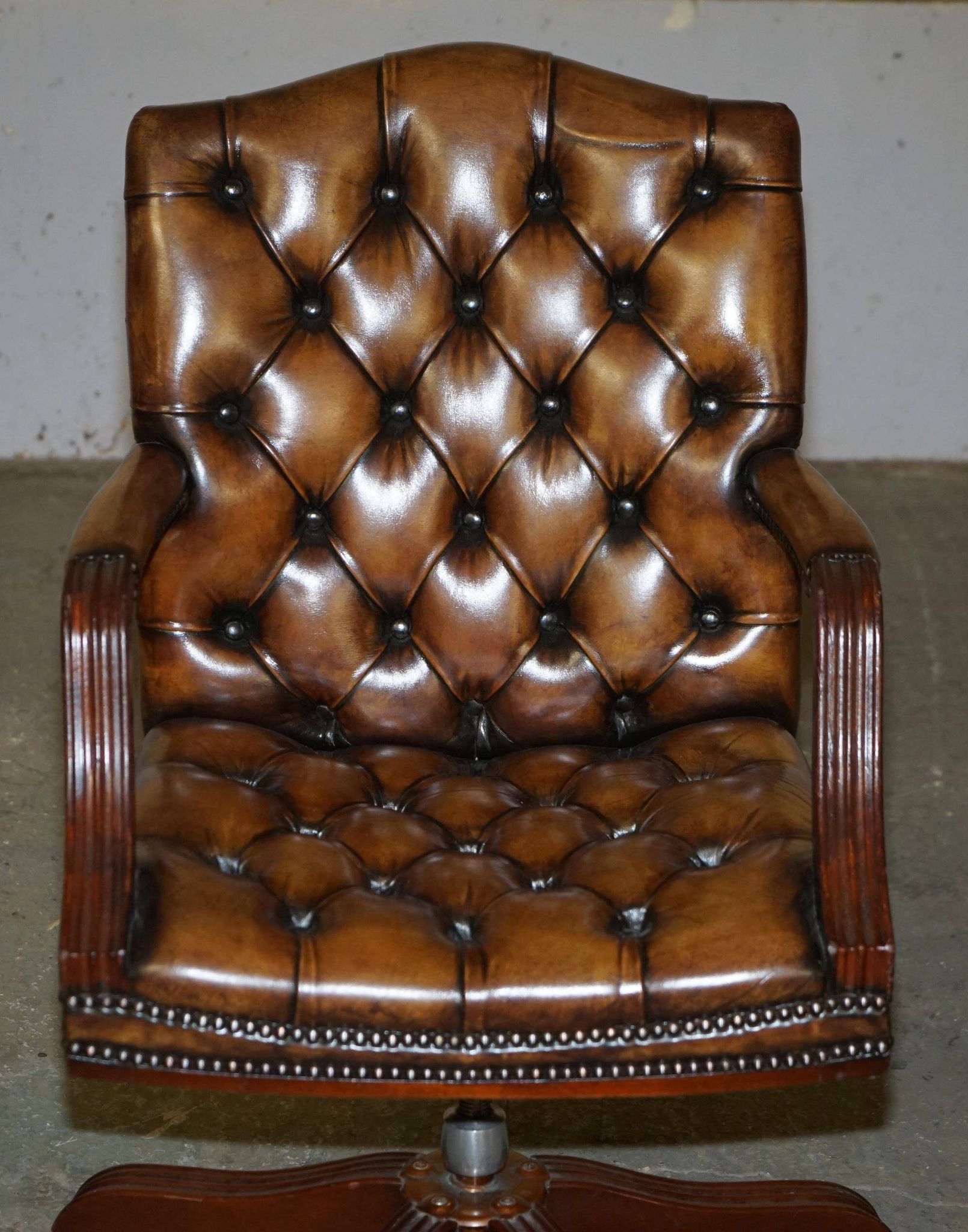 Restored leather captain's Chesterfield chair