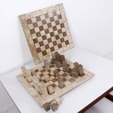 Modernist two-tone travertine chess set, Italy, 1970s