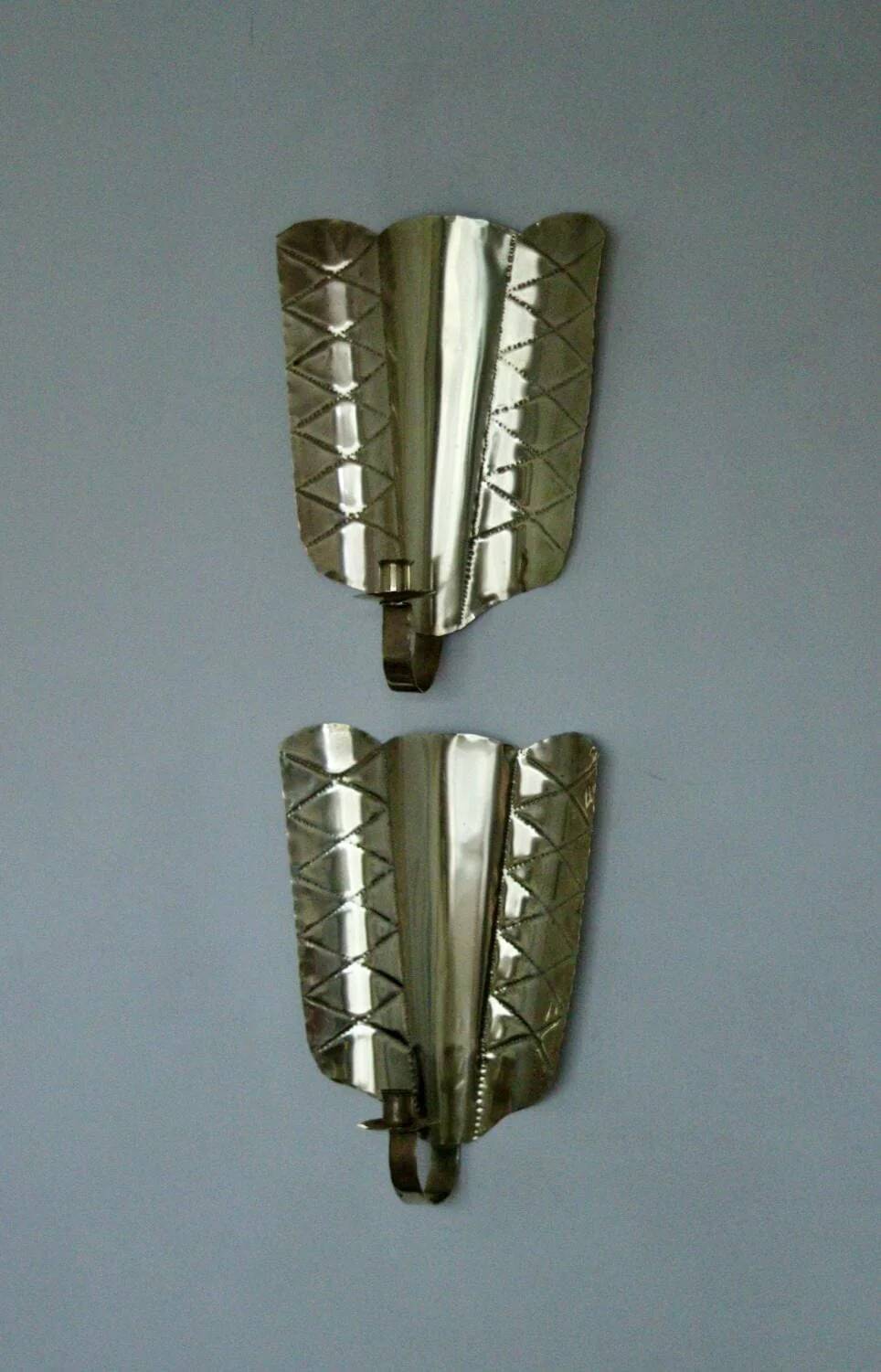 Pair of mid-century Swedish brass shield shape sconces