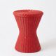 Vintage hourglass stool in red wicker or woven rattan.