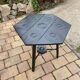 Hexagonal side table in black painted wood, engraved floral decoration, 1920s vintage style.