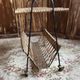 Rattan magazine rack, vintage from the 1960s.
