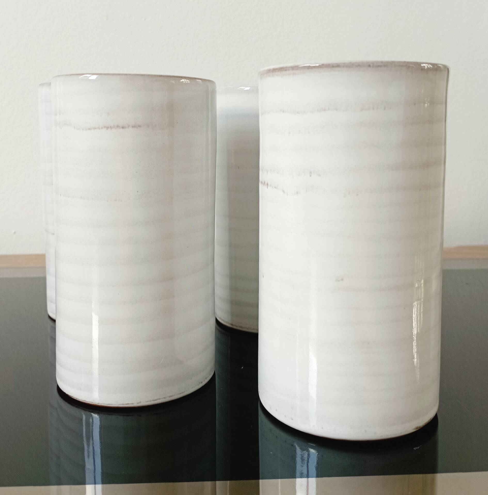 4 vintage stoneware cups in white