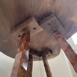 Table and its solid wooden stool of brutalist style popular art