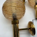 Set of 3 globe wall lights in glass and gold metal