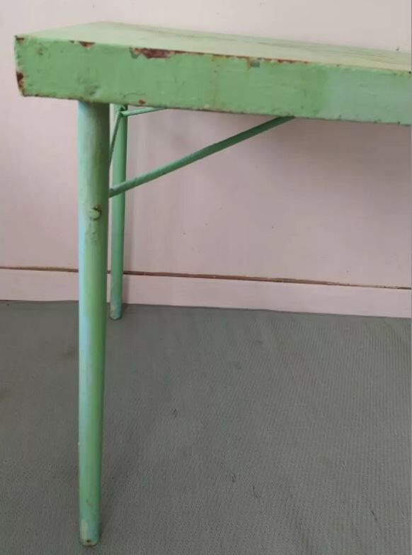 Green garden table in patinated metal