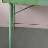 Green garden table in patinated metal