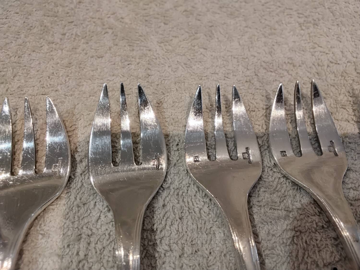 12 silver-plated oyster forks by Christofle America